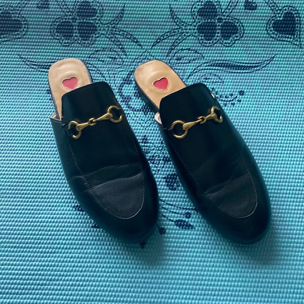 Black mule with gold hardware